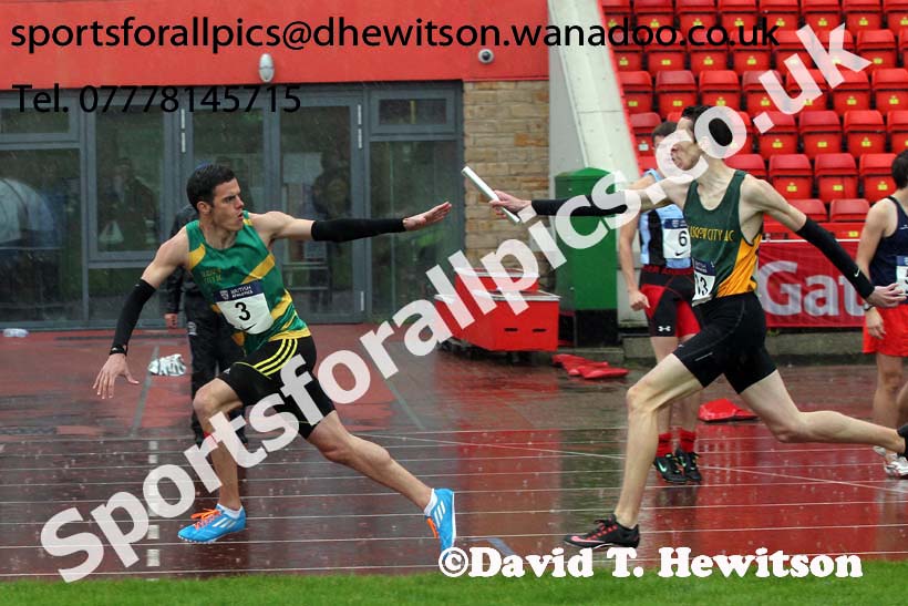 Glasgow change-over during the 4 x 400 metres relay in the worst conditions of the day, British National League, Division 1, Gateshead. Photo: David T. Hewitson/Sports for All Pics